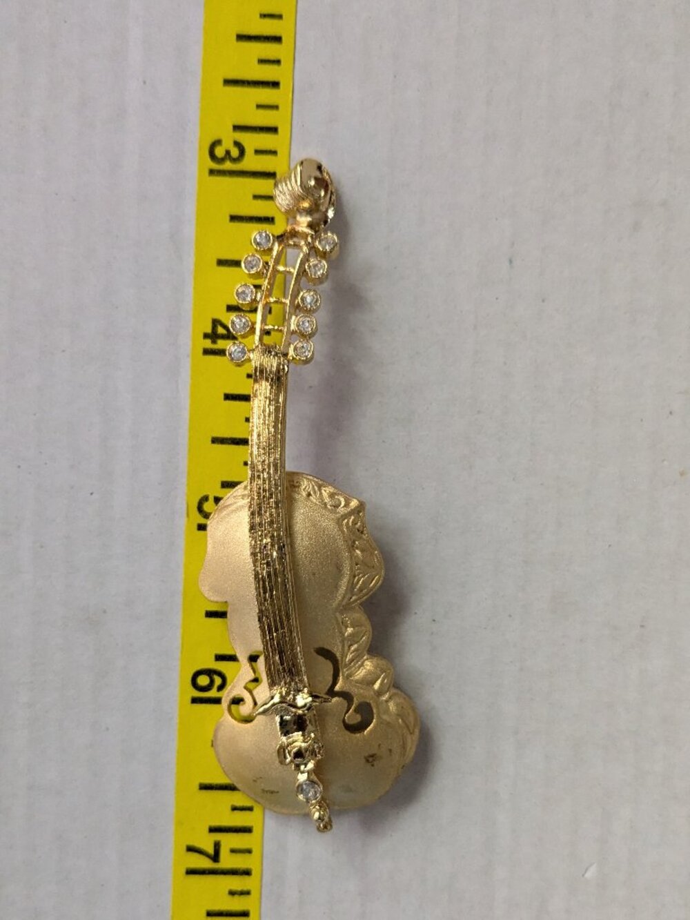 Vintage TONA Gold Tone Rhinestone Cello Brooch Pin